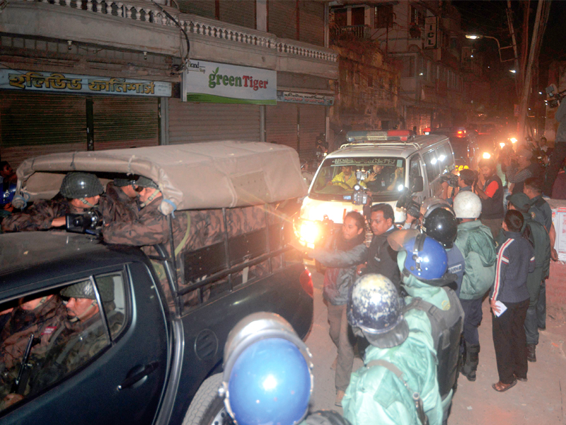 bangladesh border guards escort ambulances with one carrying the body of abdul quader molla photo afp