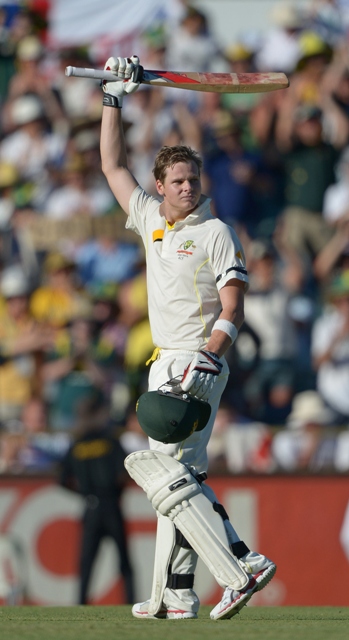 a vital century by steve smith puts australia in a strong position against england on day one photo afp