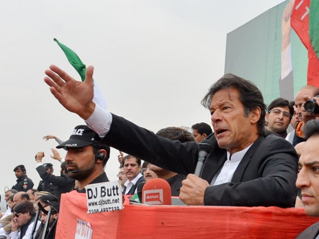 imran khan chairman of pakistan tehreek e insaaf pti party addresses a protest rally in peshawar on november 23 2013 photo afp file