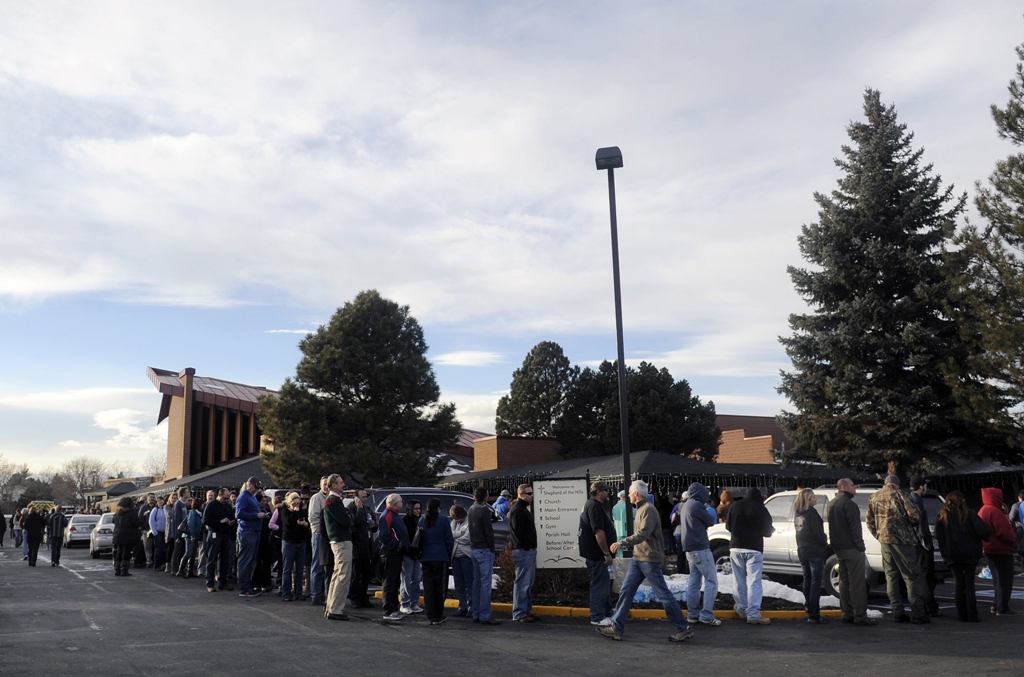 parents wait at shepherd of the hills church to be reunited with their children after a school shooting on december 13 2013 at arapahoe high school in centennial colorado photo afp