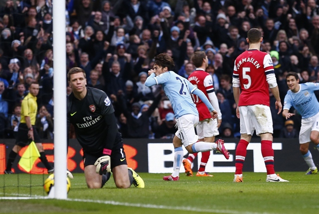 asserting dominance manchester city moved to with three points of arsenal at the top of the league after defeating them 6 3 at home on saturday photo reuters