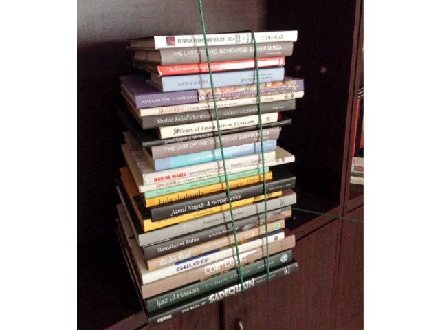 books of different disciplines are tied with a rope at unicorn gallery in karachi sumaya durrani s two day art exhibition shahkaar which concluded on saturday was spread across 11 galleries in the city to allow art lovers to experience an artistic journey photo courtesy unicorn gallery books of different disciplines are tied with a rope at unicorn gallery in karachi sumaya durrani s two day art exhibition shahkaar which concluded on saturday was spread across 11 galleries in the city to allow art lovers to experience an artistic journey photo courtesy unicorn gallery