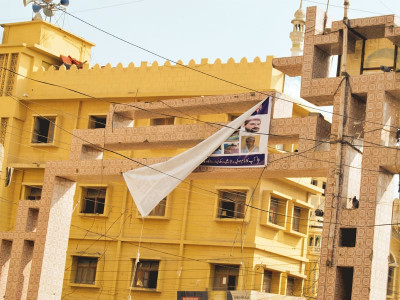 all cards on the table banners of wanted criminals in lyari go missing two days later all cards on the table banners of wanted criminals in lyari go missing two days later