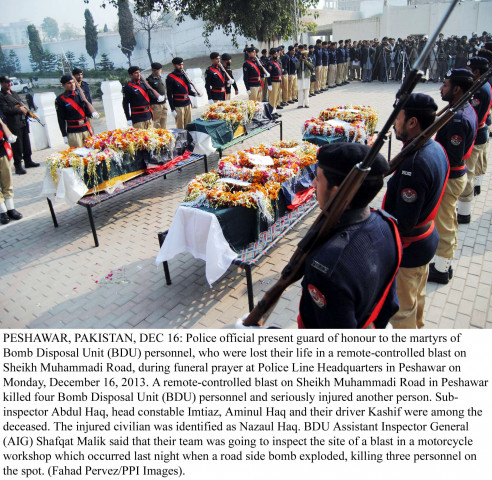 police officials present a guard of honour at the police line headquarters in peshawar on monday to the bds officials who were killed in an ied attack photo ppi police officials present a guard of honour at the police line headquarters in peshawar on monday to the bds officials who were killed in an ied attack photo ppi