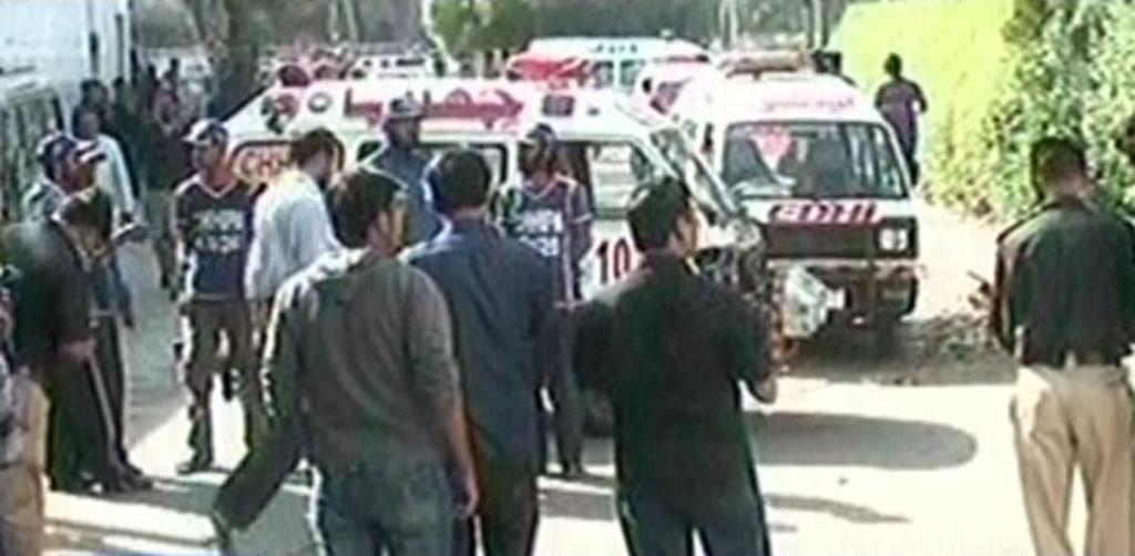 express news screengrab of people and ambulances at the scene of the blast
