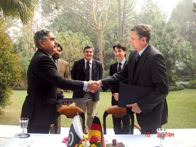 ambassador cyrill nunn and hec chairperson imtiaz gilani shake hands after signing the agreement photo express ambassador cyrill nunn and hec chairperson imtiaz gilani shake hands after signing the agreement photo express