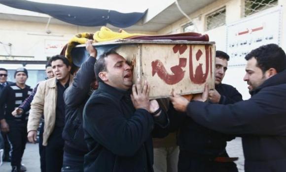 mourners carry the coffin of their relative who was killed in an attack in the town of yusfiya on tuesday photo reuters