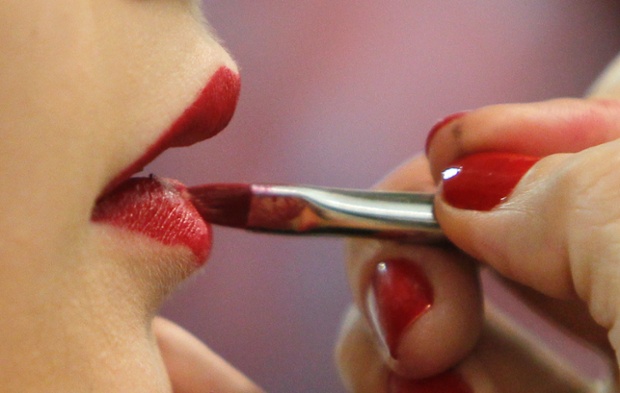 a model has her makeup done backstage during ukrainian fashion week in kiev photo reuters