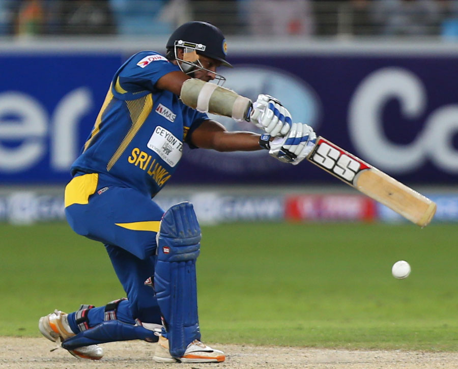 sri lanka 039 s batsman kumar sangakkara plays a shot during their 2nd one day international cricket match against pakistan in dubai on december 20 2013 photo afp