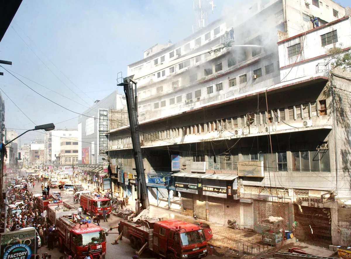 fire fighters work to put out a blaze on the fifth floor of panorama centre in karachi photo rashid ajmeri express fire fighters work to put out a blaze on the fifth floor of panorama centre in karachi photo rashid ajmeri express