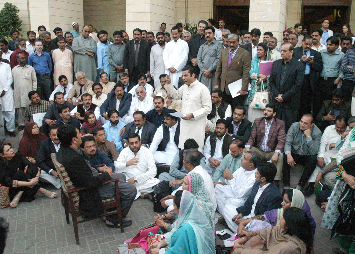 leader of the opposition in sindh assembly faisal sabzwari c delivers a speech at the mock assembly set up by opposition members outside the sindh assembly on friday photo irfan ali express