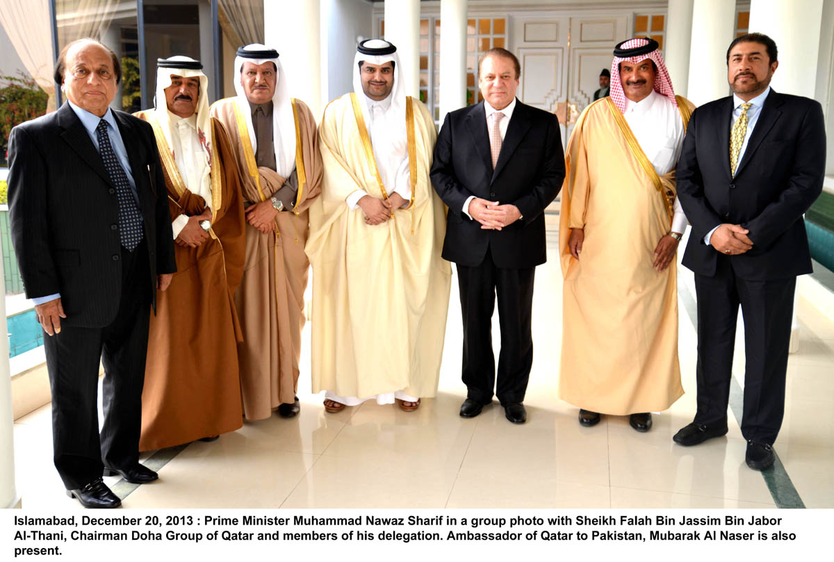 prime minister nawaz sharif in a group photo with sheikh falah bin jassim bin jabor al thani chairman board of directors of doha group and members of his delegation on december 20 2013 photo pid