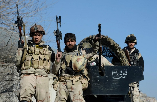 file photo of afghan commandos sitting on the top of their vehicle photo afp file photo of afghan commandos sitting on the top of their vehicle photo afp