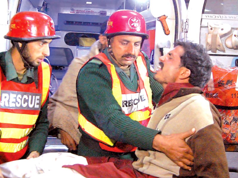 rescuers shifting an injured person photo muhammad javaid express