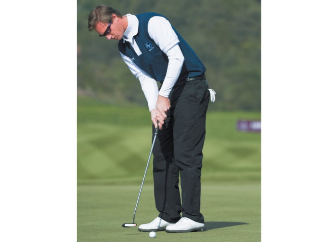 nicolas colsaerts of belgium makes the last putt to secure a victory for europe at 8 7 against asia photo afp