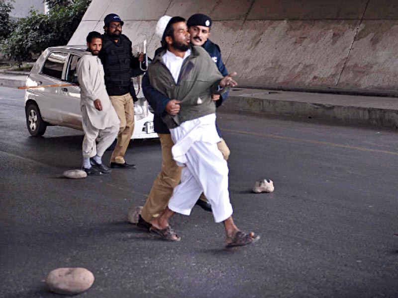 protesters being whisked away by police in rawalpindi photo express