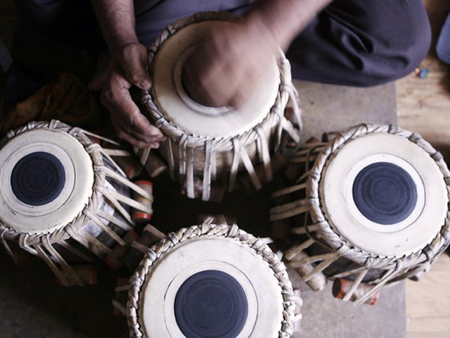 according to ustaad ameer ali a musician and a singer the musical arrangement includes yaktaro a single stringed instrument harmonium tabla dholak clapperstick and vocalist photo afp file