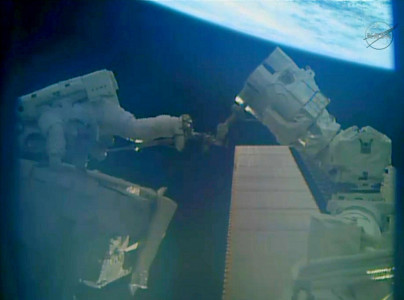 nasa astronauts step out on christmas eve spacewalk nasa astronauts step out on christmas eve spacewalk