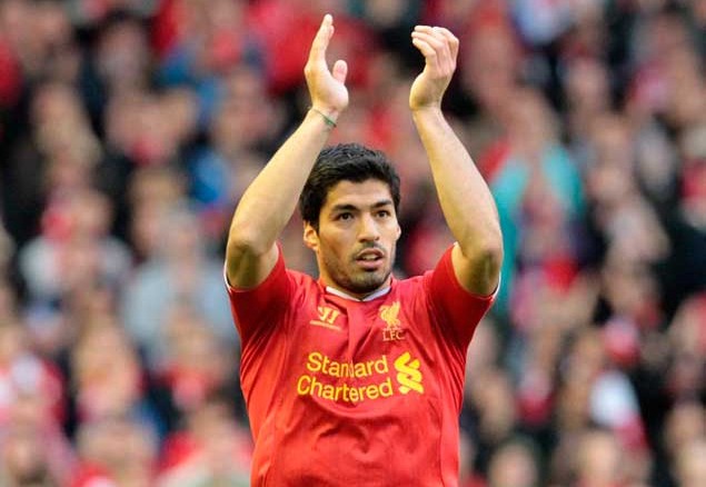 clash of the titans liverpool will be banking on star striker luis suarez as they take on manchester city at a top of the table clash on thursday photo afp