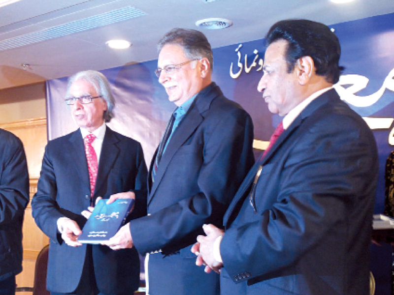 information minister pervez rashid dr pirzada qasim with the author nawab kaifee at the book launch photo express