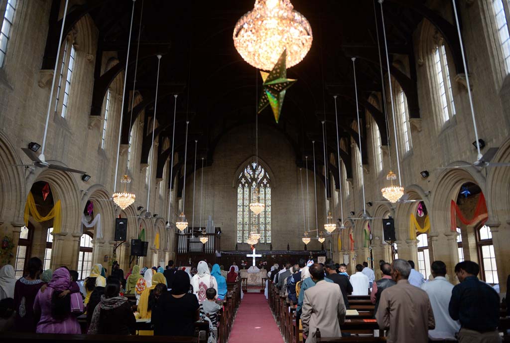 pakistani christians attend a christmas day mass at st patrick 039 s cathedral in karachi on december 25 2013 photo afp