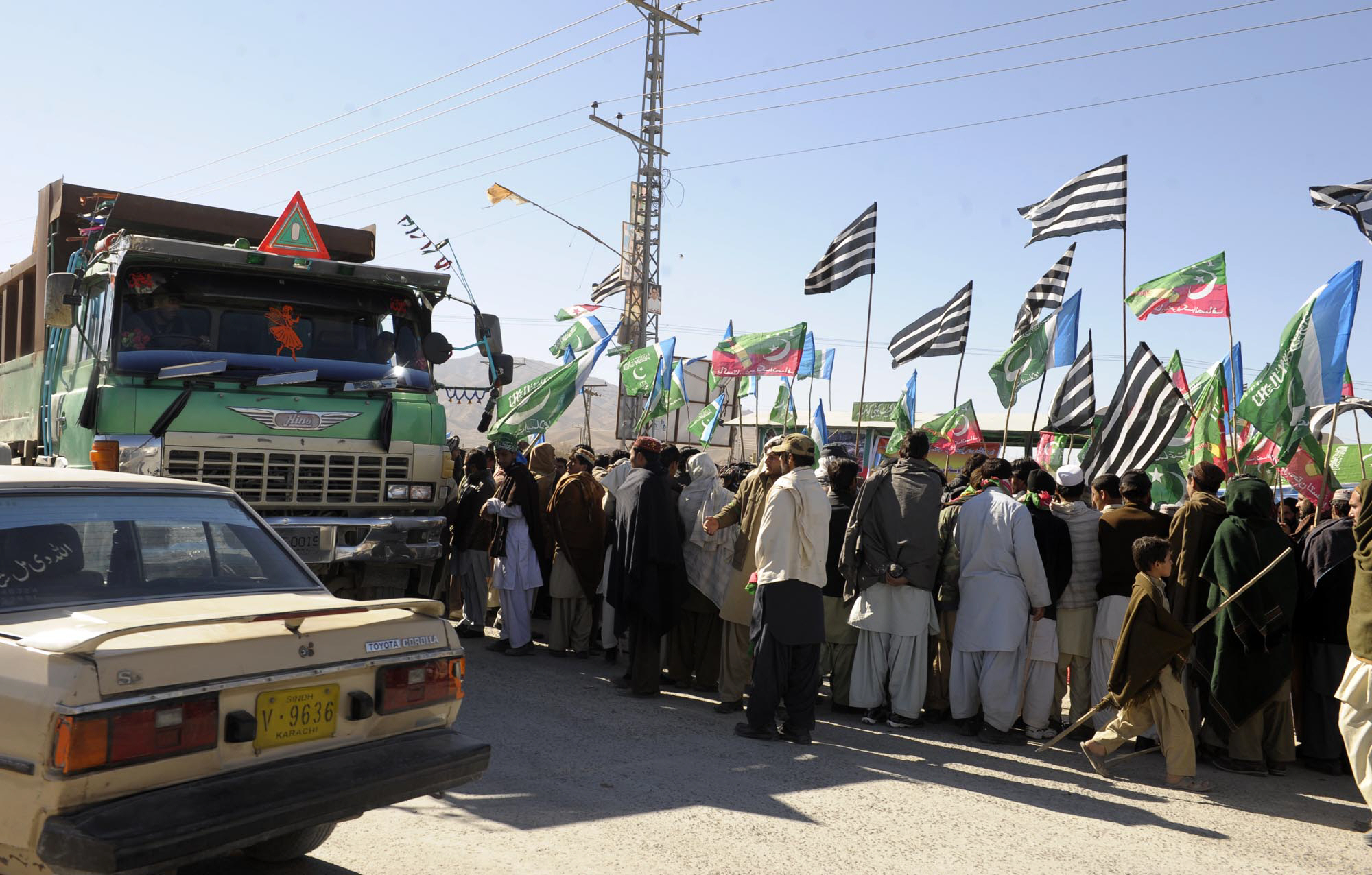 activists belonging to the pakistan tehreek e insaf and jamaat e islami stop a truck in quetta demanding to see its papers on thursday photo banaras khan express