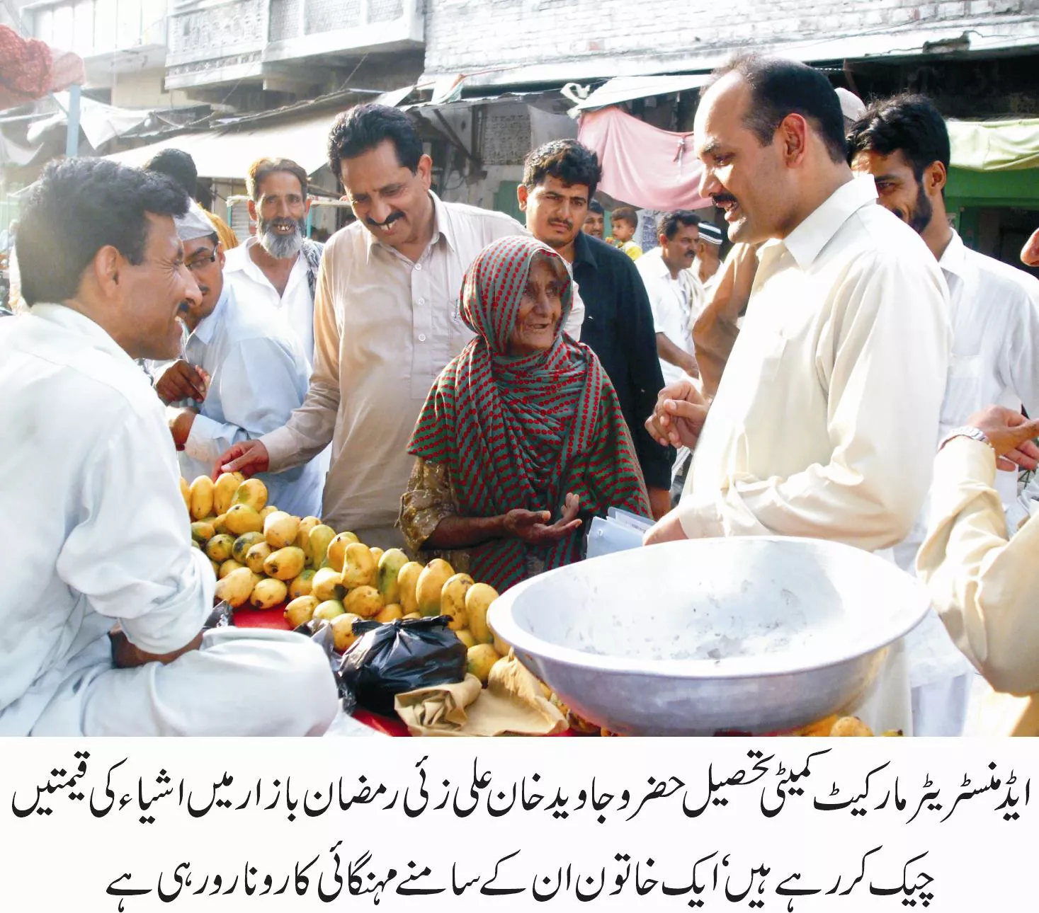 a market committee administrator checks on prices of items at a market photo agencies a market committee administrator checks on prices of items at a market photo agencies