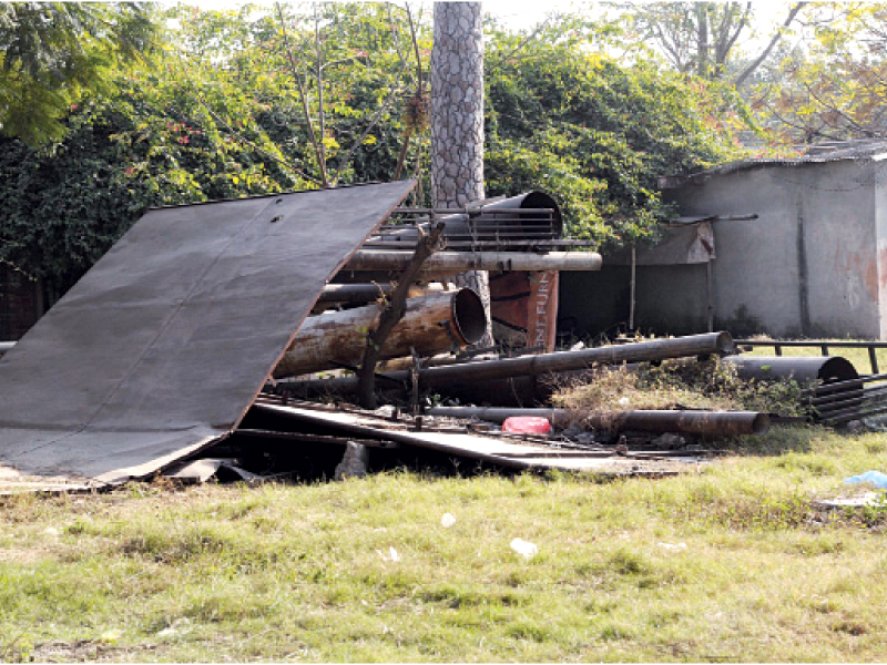 a dysfunctional fountain and discarded billboards at liaquat bagh photo agha mehroz express