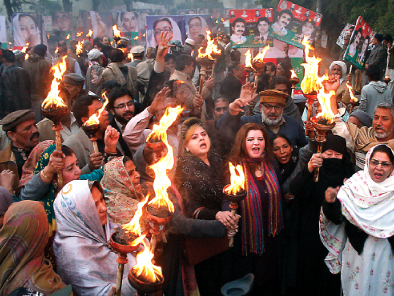 activists of pakistan peoples party held a memorial prayer for benazir bhutto outside the lahore press club on sunday dozens of activists lit candles and torches and took out a rally to mark december 27 on the sixth anniversary of the day benazir bhutto was assassinated photo abid nawaz and shafiq malik express