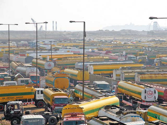 shireen jinnah workers fear that the rangers and police demand to leave the oil tankers parking yard will force them to relocate photo file