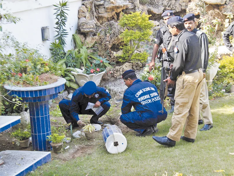 bomb disposal squad officials inspect the site where a hand grenade attack resulted in the death of a minor girl photo online bomb disposal squad officials inspect the site where a hand grenade attack resulted in the death of a minor girl photo online