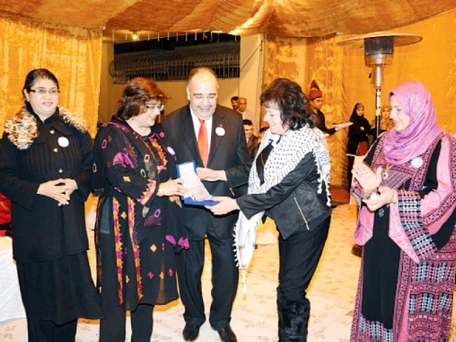 palestinian poet and rights activist dr hanan awwad receives a memento from potohar organisation for development and advocacy palestinian ambassador is also present photo express palestinian poet and rights activist dr hanan awwad receives a memento from potohar organisation for development and advocacy palestinian ambassador is also present photo express