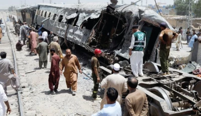 railway workers remove the wreckage of a train damaged in a suicide attack in quetta photo reuters railway workers remove the wreckage of a train damaged in a suicide attack in quetta photo reuters