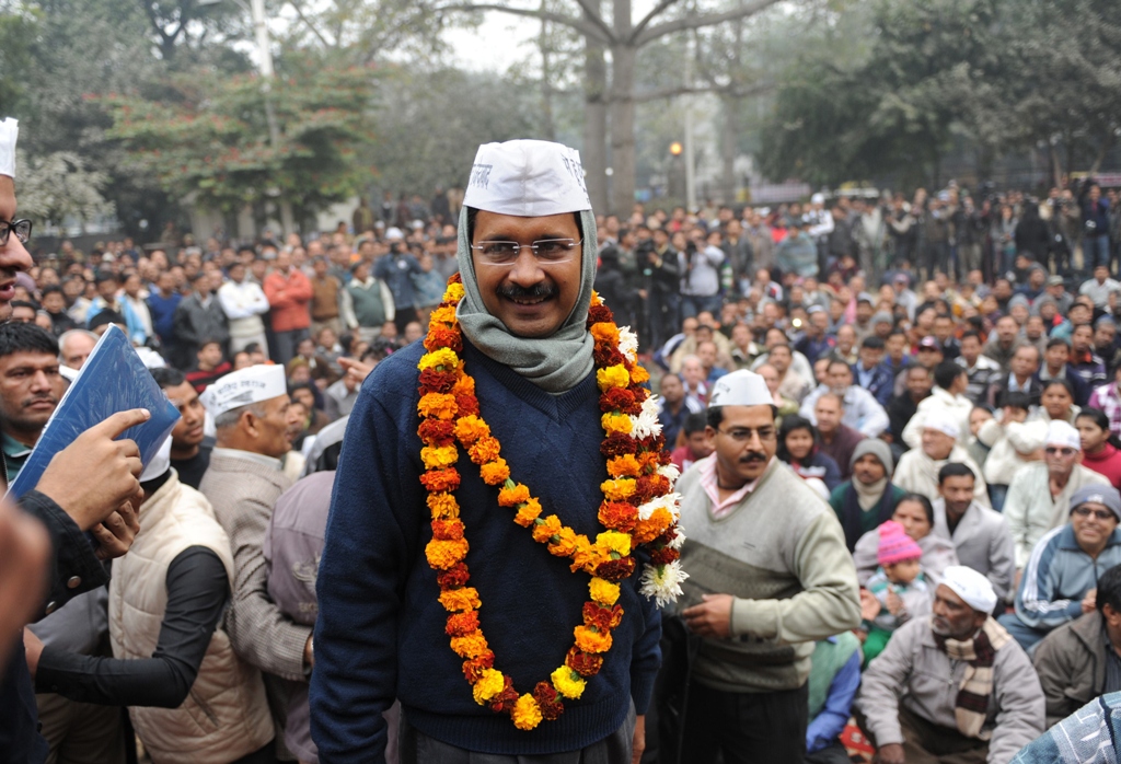 india 039 s aam aadmi party leader arvind kejriwal is greeted by supporters as he arrives at a public meeting in new delhi photo afp