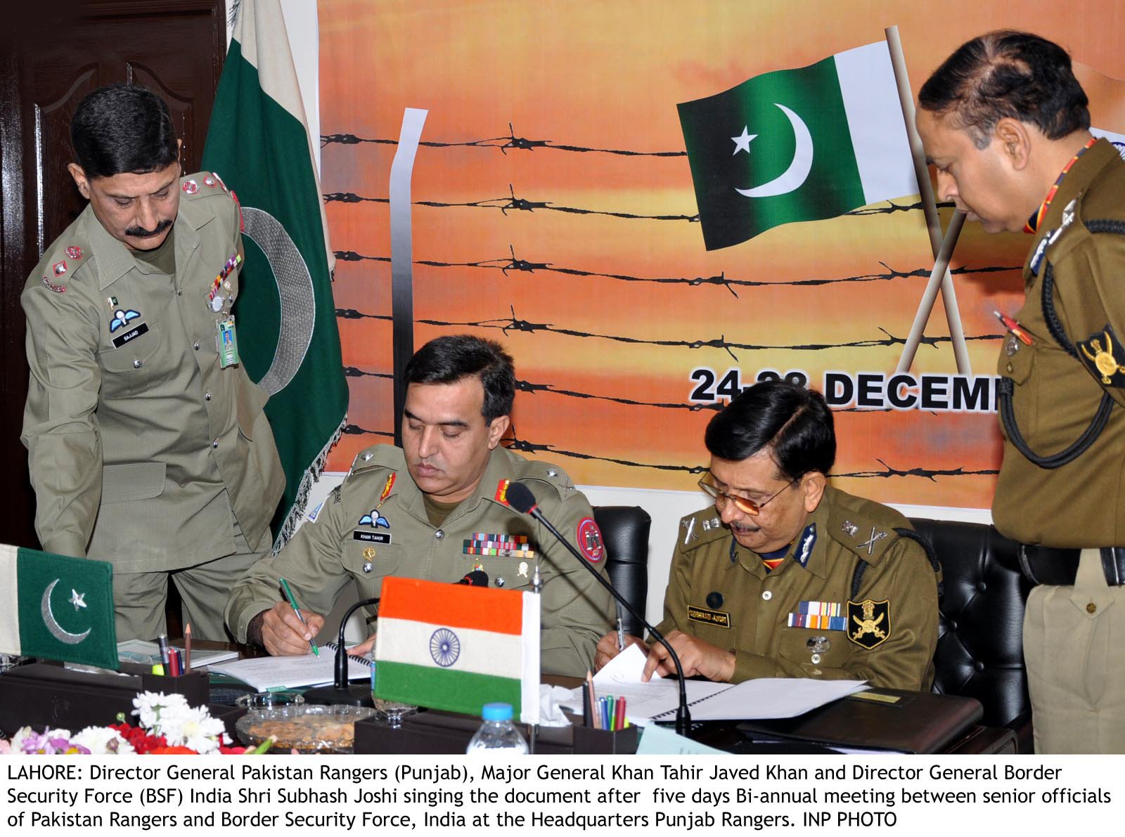 dg pakistan rangers punjab major general tahir javed khan and dg border security force bsf india shri subhash joshi signing the document at the end of the five days bi annual meeting photo inp