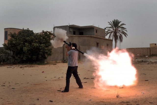 this file photo shows a man firing the russian made rocket propelled grenade rpg photo afp file this file photo shows a man firing the russian made rocket propelled grenade rpg photo afp file