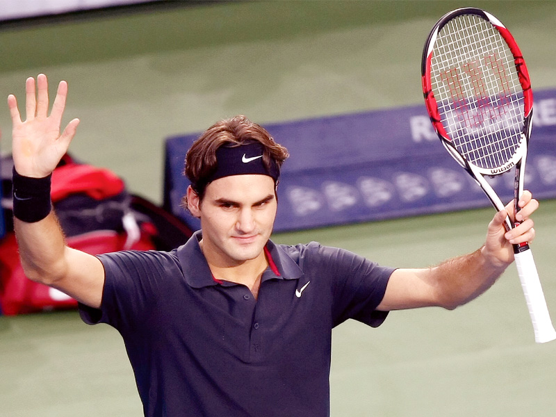 federer says the recent appointment of stefan edberg to his coaching staff is an indication he still has the desire to compete at the top level photo afp