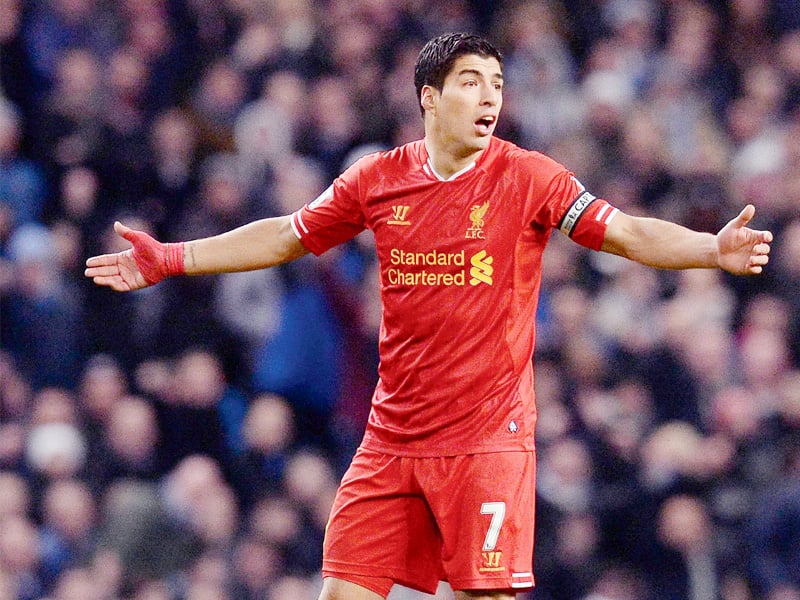 liverpool will be pinning hopes on striker suarez to come away with three points and prove their credentials in the title case photo afp