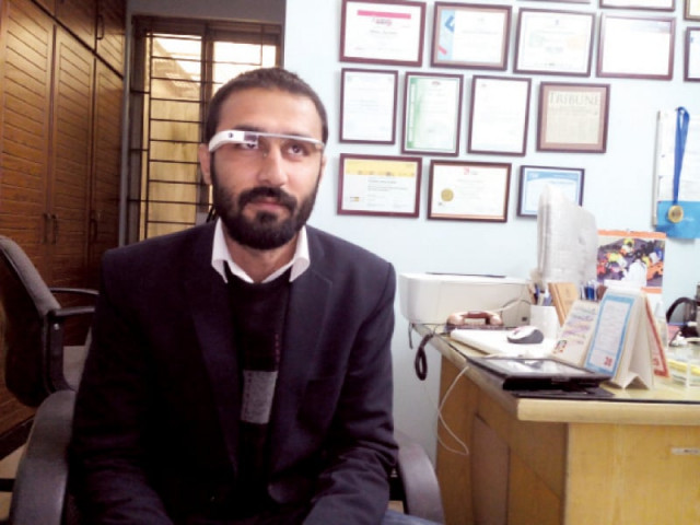 a man is testing out the wearable technology device photo express