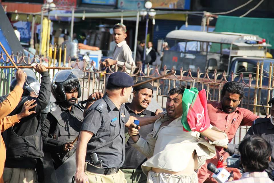 pti ppp supporters exchange blows hurl stones at each other and at passing vehicles photo ayesha mir the express tribune