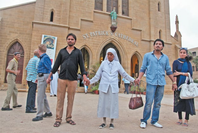 the sunday after the deadly attack on a church in peshawar a large number of people formed a human chain outside st patrick s cathedral as the christian community offered prayers inside photos ayesha mir express the sunday after the deadly attack on a church in peshawar a large number of people formed a human chain outside st patrick s cathedral as the christian community offered prayers inside photos ayesha mir express