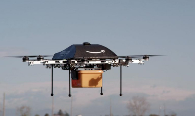 this photo released by amazon on december 1 2013 shows a flying quot octocopter quot mini drone t hat would be used to fly small packages to consumers photo afp this photo released by amazon on december 1 2013 shows a flying quot octocopter quot mini drone t hat would be used to fly small packages to consumers photo afp