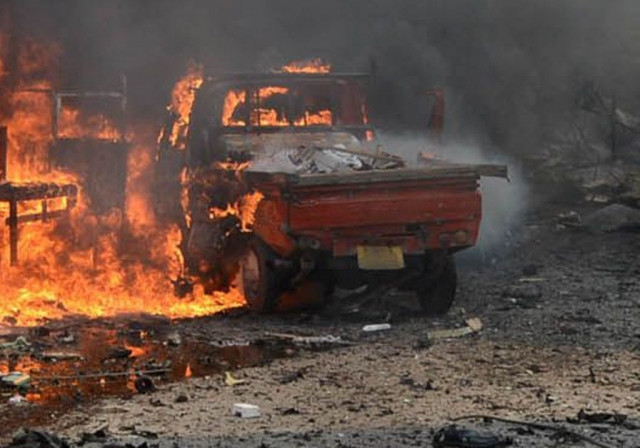 file photo of a vehicle after an explosion in peshawar photo afp file file photo of a vehicle after an explosion in peshawar photo afp file