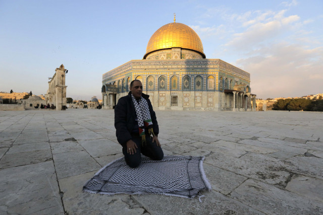 ahmad khalaf prays outside al aqsa mosque after he was released from an israeli prison photo reuters ahmad khalaf prays outside al aqsa mosque after he was released from an israeli prison photo reuters