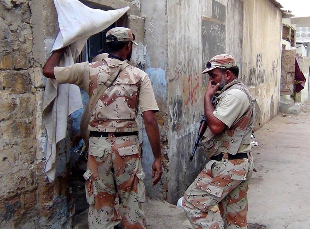 rangers soldiers checking a house during a targeted operation in karachi photo online