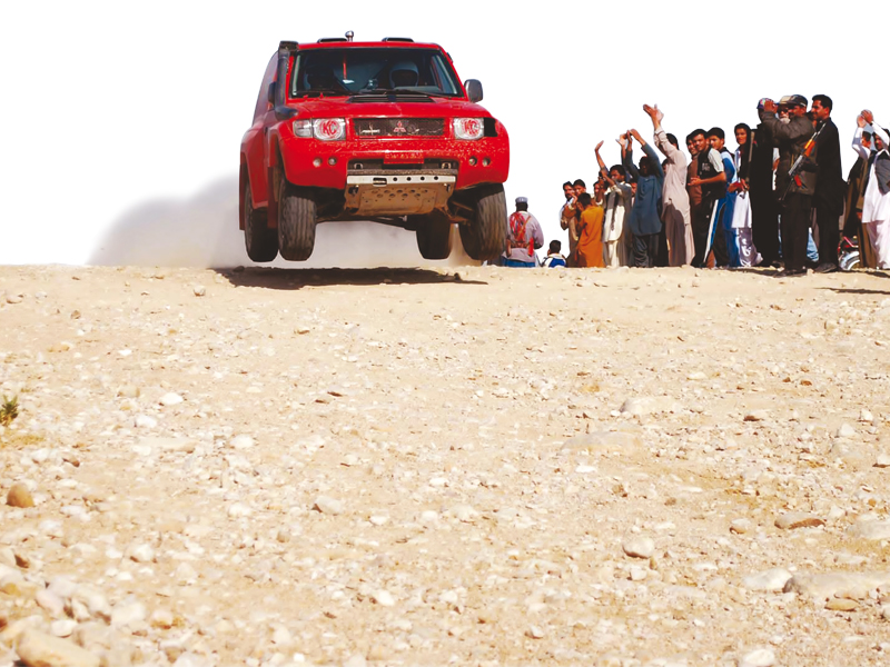 race is on rally enthusiast nauman khan s mind as he speeds through the 2013 jhal magsi desert challenge held in december photos cyrus nader