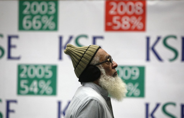a trader monitors an electronic board unseen displaying index during a trading session at the karachi stock exchange january 2 2014 photo reuters a trader monitors an electronic board unseen displaying index during a trading session at the karachi stock exchange january 2 2014 photo reuters