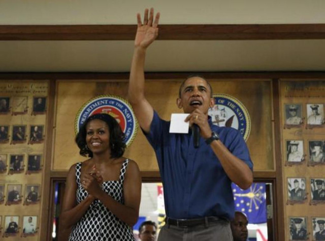 us president barack obama r and first lady michelle obama greet military personnel during a christmas day visit to marine corps base hawaii in kaneohe hawaii december 25 2013 photo reuters us president barack obama r and first lady michelle obama greet military personnel during a christmas day visit to marine corps base hawaii in kaneohe hawaii december 25 2013 photo reuters