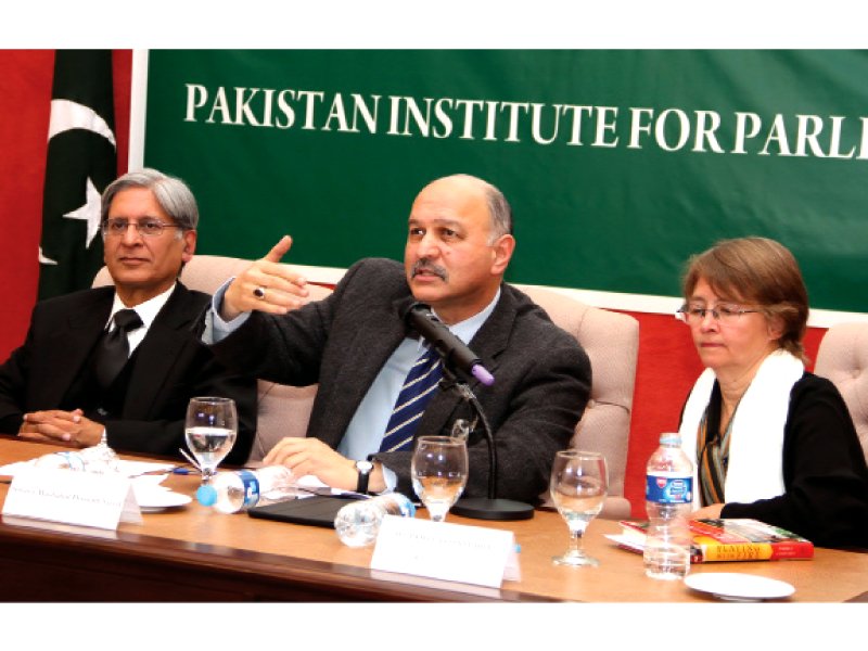 senator mushahid hussain speaks at a seminar defence development and democracy photo express