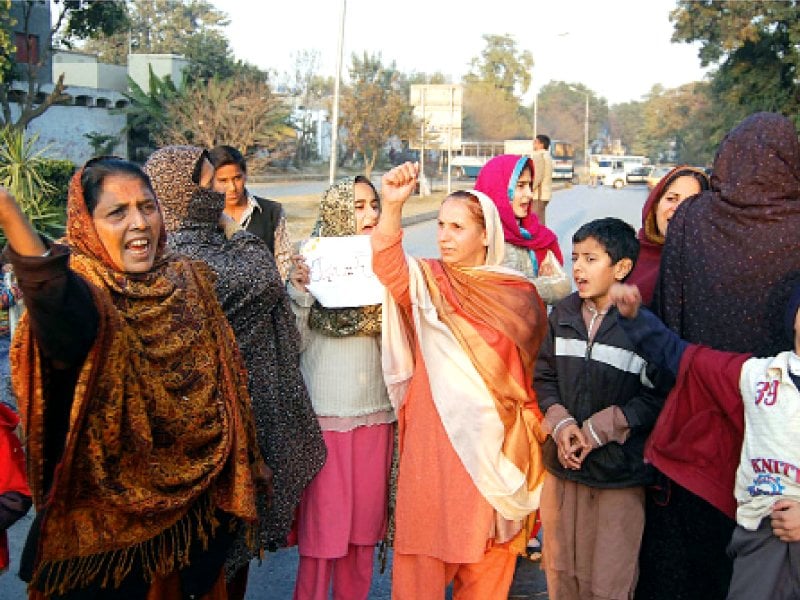 enraged residents voicing their protest against cold hearths and homes photo muhammad javaid express